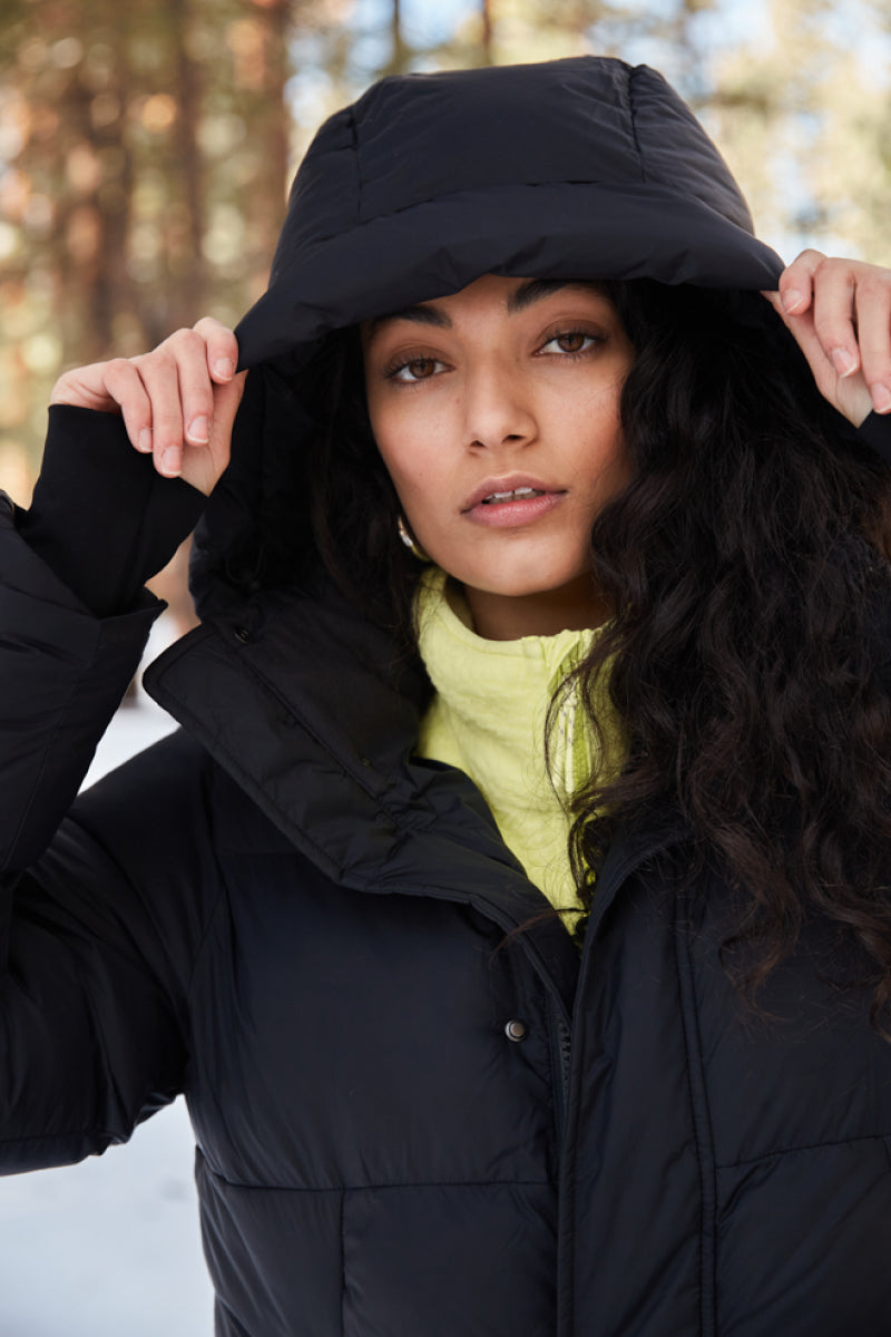 Woman Wearing Black Parka Puffer Jacket