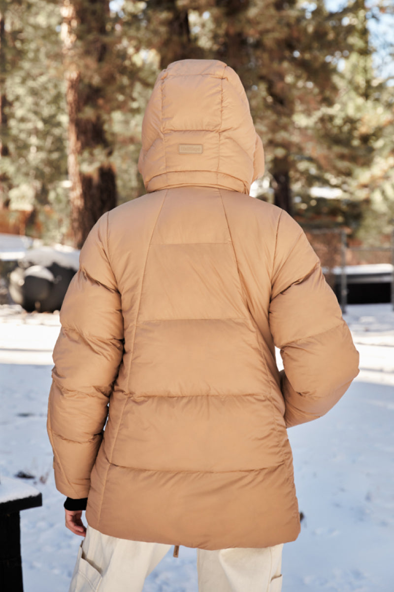 Woman Wearing Chai Colored Parka Puffer Jacket